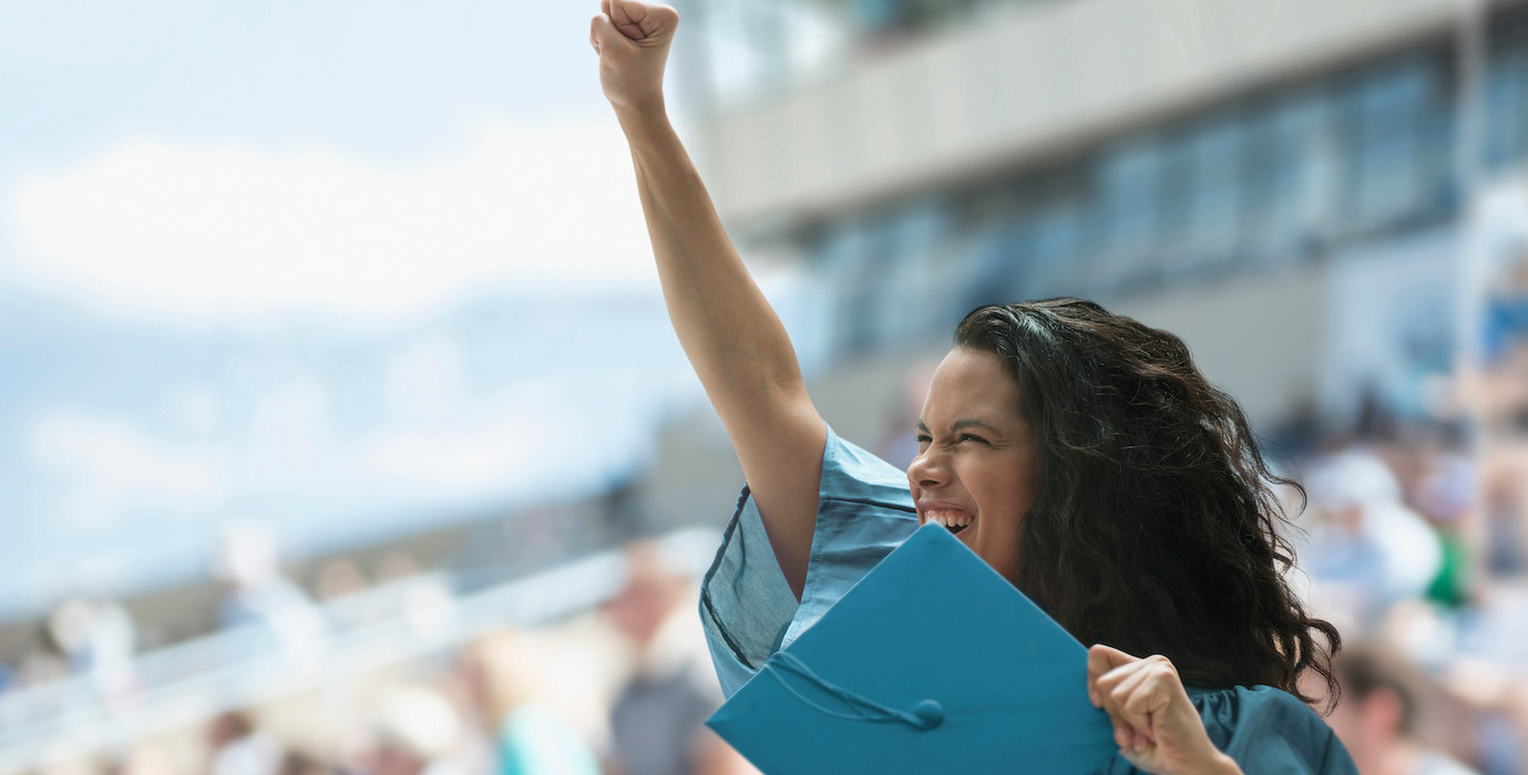 Women is happy because she graduated and receives her diploma. 