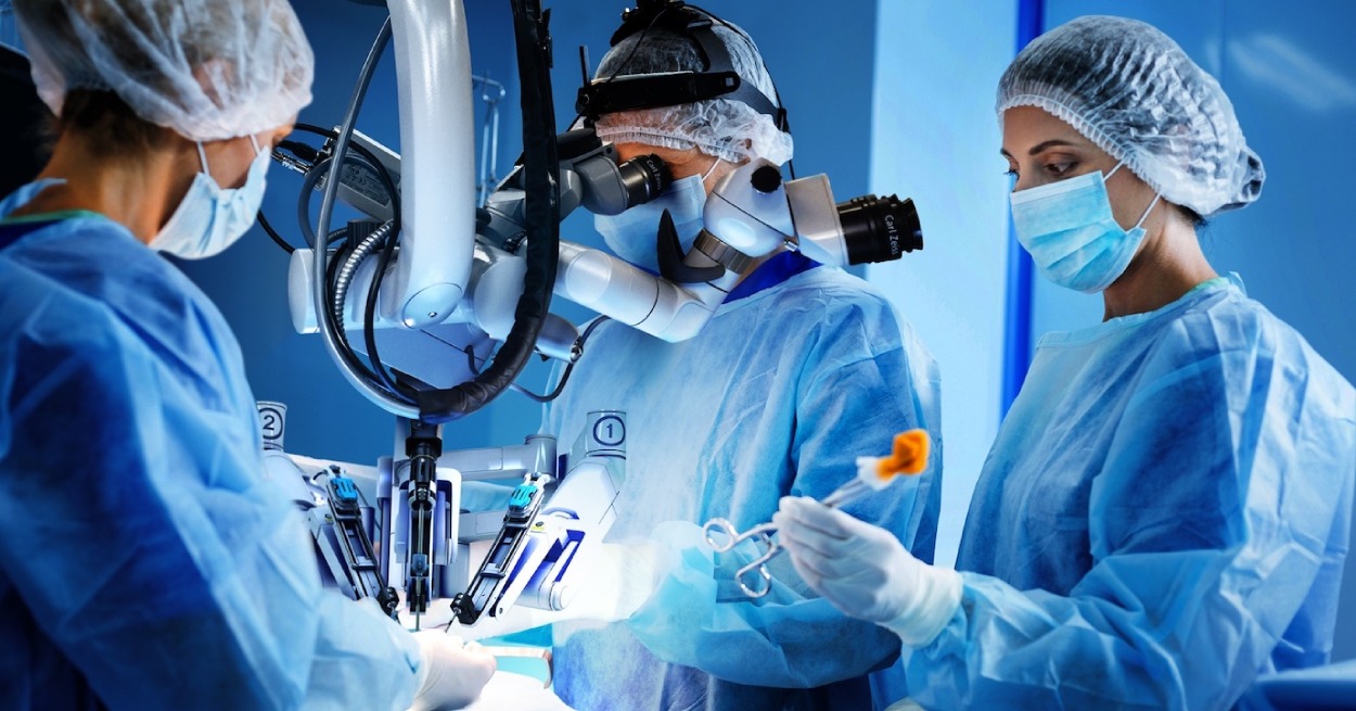 Picture of a microsurgery with three surgeons